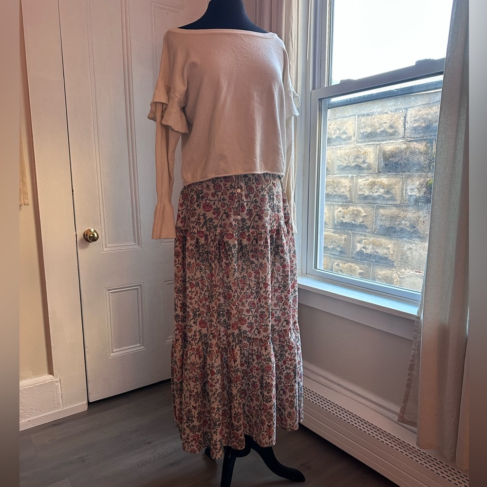 beige floral ankle length tiered skirt with button up detail on the front.
